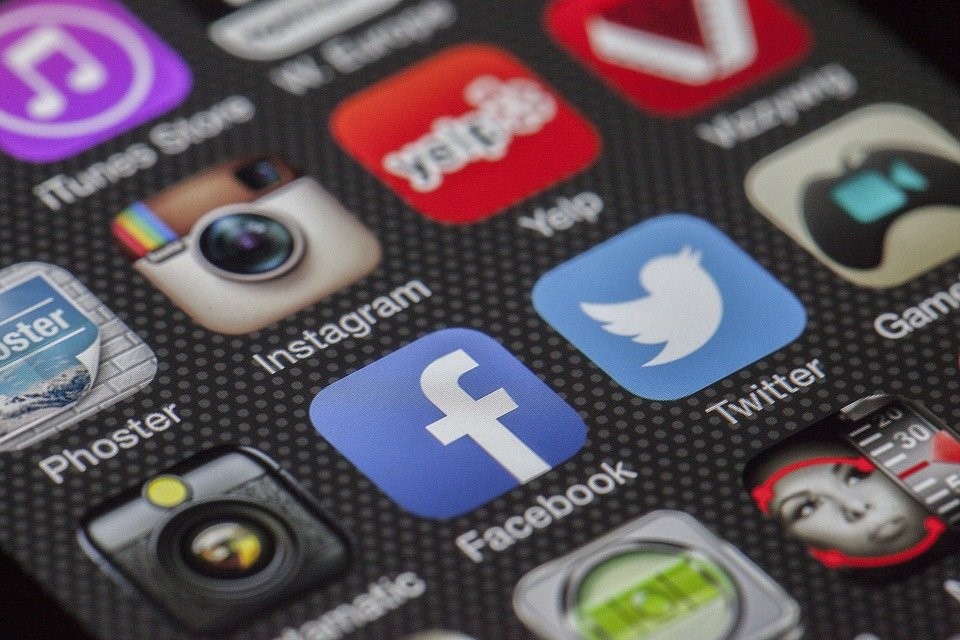 social media icons on a phone screen